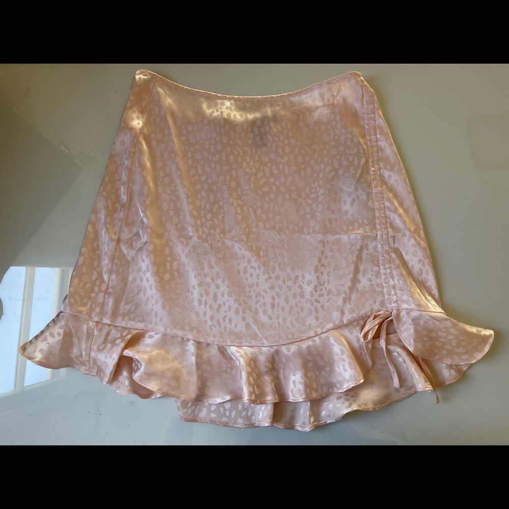 Light pink cheetah print mini skirt